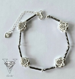 BRANSOLETKA KWIATOWE SREBRNE HEMATYTY  Z CZARNYMI PRZEKŁADKAMI I PRZEDŁUŻKĄ OD VIVA JEWELRY & ART