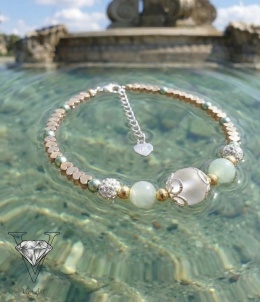 BRANSOLETKA OD VIVA JEWELRY PŁYWAJĄCA W ZIELONEJ WODZIE