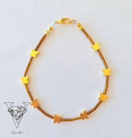 UROKLIWA BRANSOLETKA Z HEMETYTOWYCH MOTYLKÓW